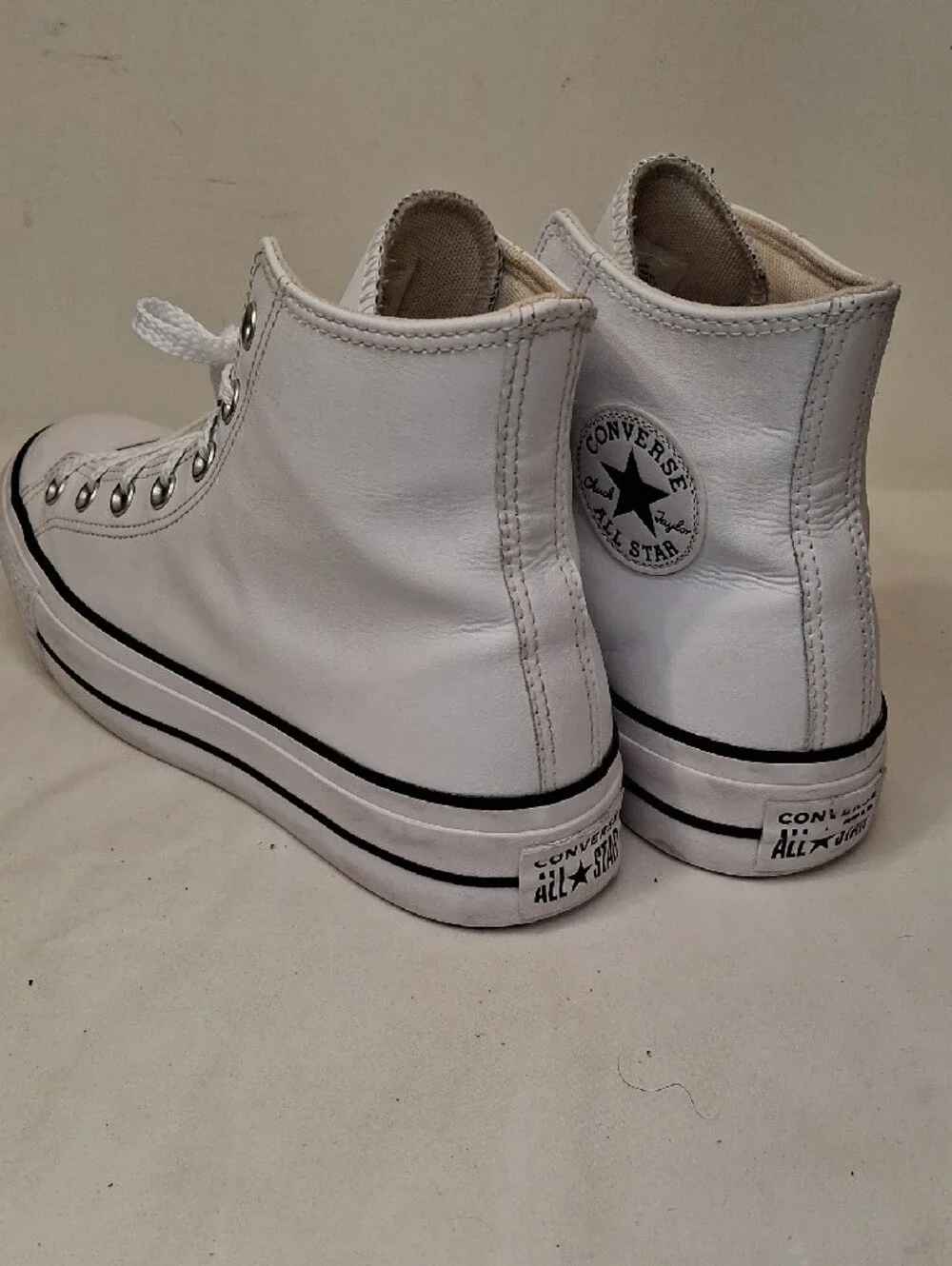 Converse Women's Leather White High Top Platform Sneakers with Black Stripe